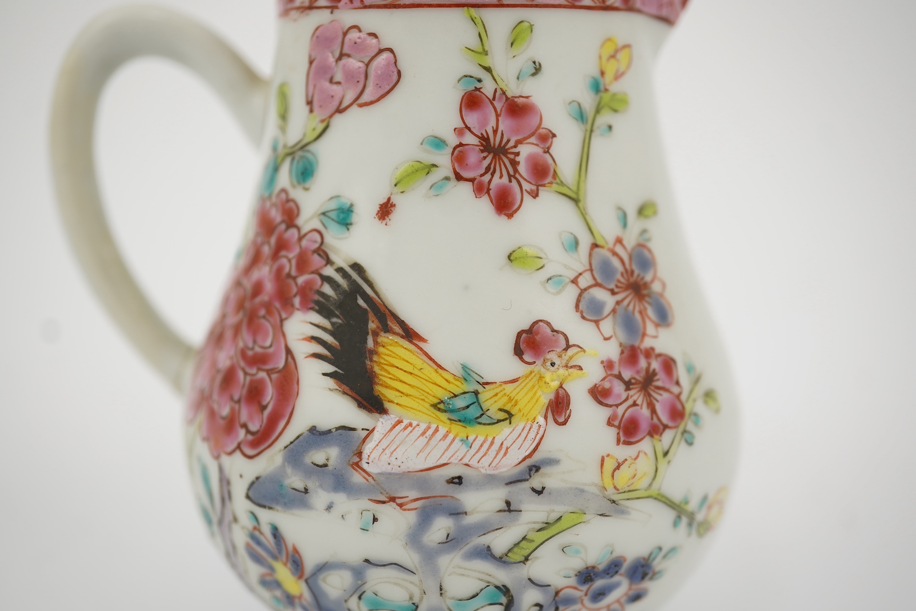 A Chinese famille rose ‘cockerel’ cream jug and cover, Yongzheng period